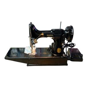 Vintage Black Singer Sewing Machine Featherweight Gold Emblems.